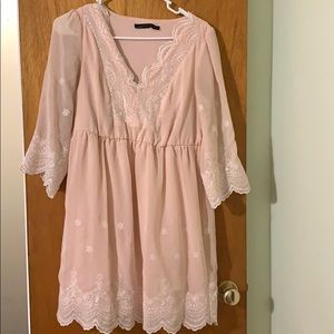 Light pink blouse with embroidery